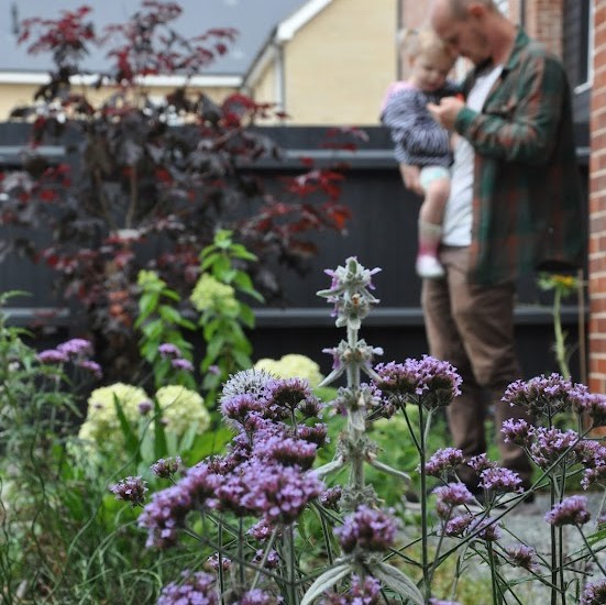 Father and Daughter in Flower Garden
